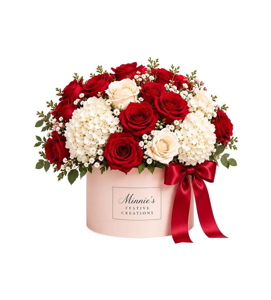Grand arrangement of red roses and white hydrangea with a red satin bow
